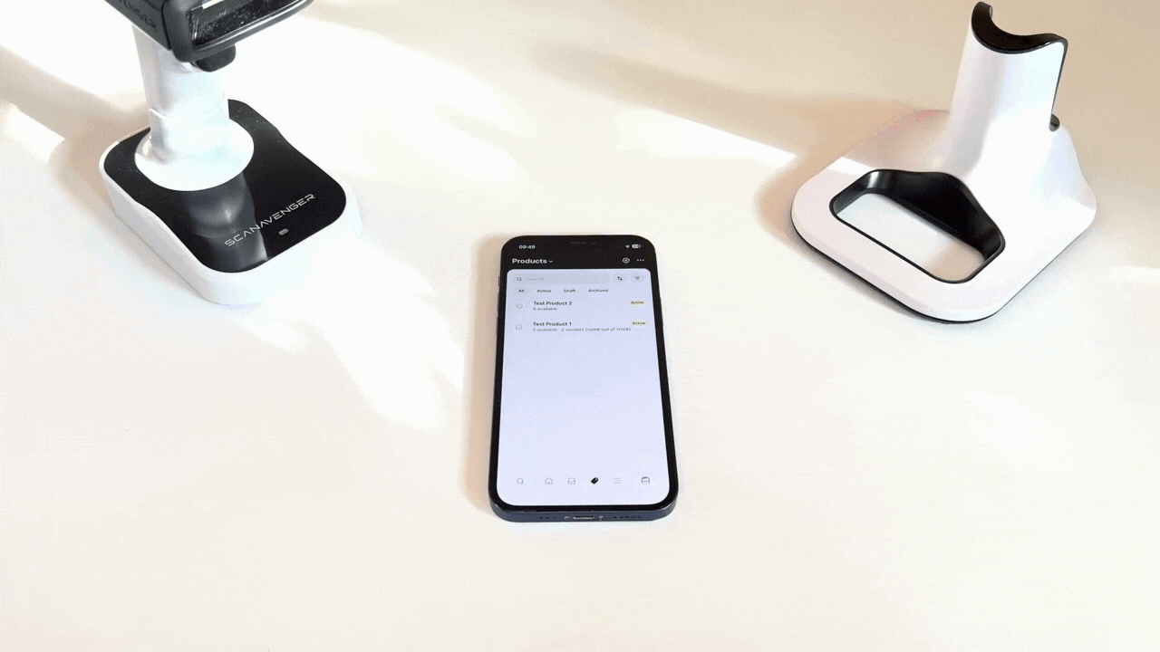 Tapping the search bar in Shopify Admin, then scanning a barcode
